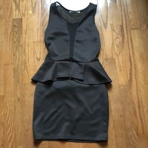 A black Rolla Coster midi dress.